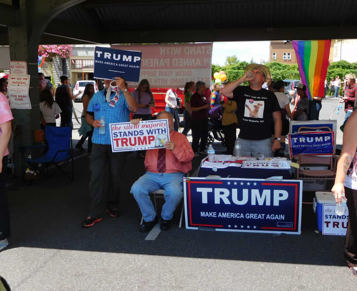 Gay white men campaigning for an anti-gay candidate at at Bellingham Pride Festival, July 11, 2016. Photo by Robert Ashworth, CC 2.0