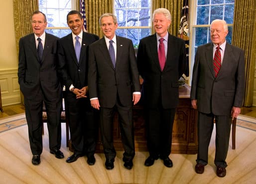 In January 2009, President of the United States of America, George W. Bush invited then President-Elect Barack Obama and former Presidents George H.W. Bush, Bill Clinton, and Jimmy Carter for a lunch meeting at The White House, posed in Oval Office.