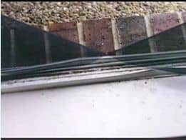 Police opined that Darlie sliced this screen with a bread knife from her kitchen to support her story of an intruder