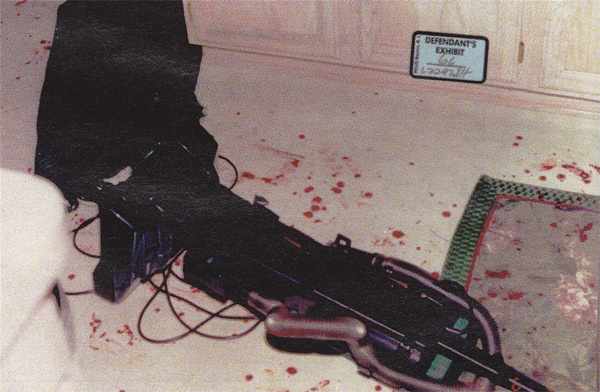 If the two police officers did not see this laying in the middle of the kitchen, it wasn't there