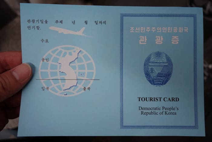All maps in North Korea show a Unified Korea, as does this tourist card. While tourists are welcomes, their actions are highly controlled and monitored.
