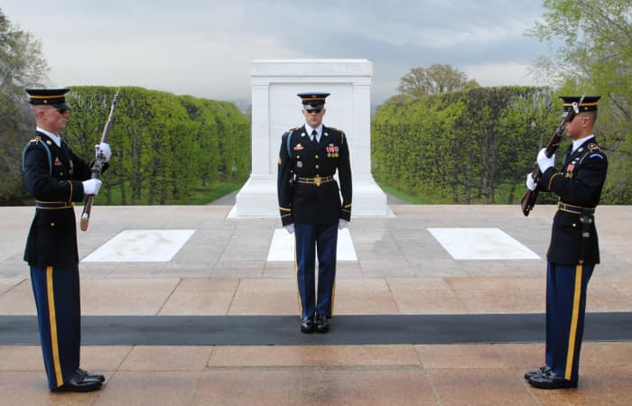 The Changing of the Guard at the Tomb of the Unknowns is an event that is distinctly patriotic. It symbolizes respect and gratitude for those that have made great sacrifices for America. Few people would confuse it with nationalism or fascism.