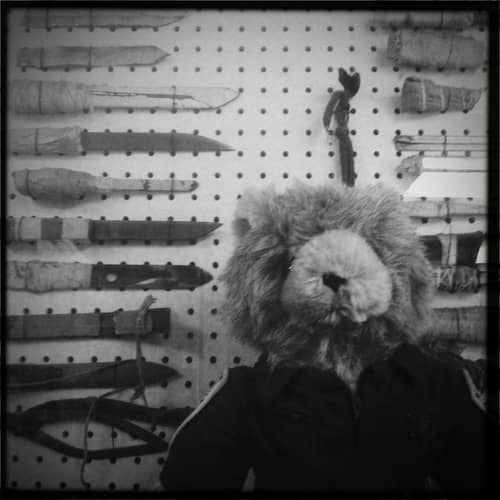Homemade knifes (shanks) taken from inmates at Folsom Prison along with the official prison teddy bear.