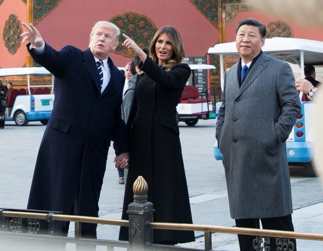 Photograph of U.S. President Donald Trump and First Lady Melania Trump visit Beijing, China accompanied by Chinese President Xi Jinping (2017); photograph by U.S. government employee courtesy of Wikimedia Commons. Work is in the public domain.