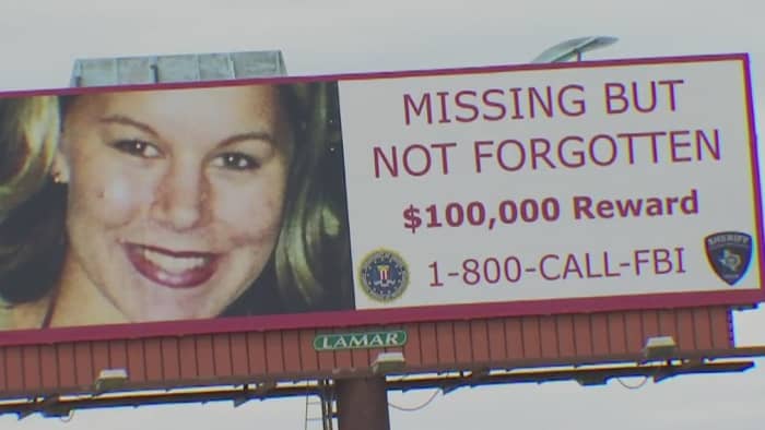 FBI billboard offering a $100,000 reward for information leading to the whereabouts of Rachel Cooke who vanished January 10, 2002.