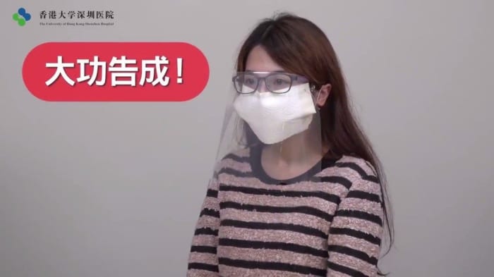 The image is from the instructional video released by the university hospital. The legend in Chinese reads ”大功告成“ which dictionaries translate as successful completion, or a task that has been accomplished.