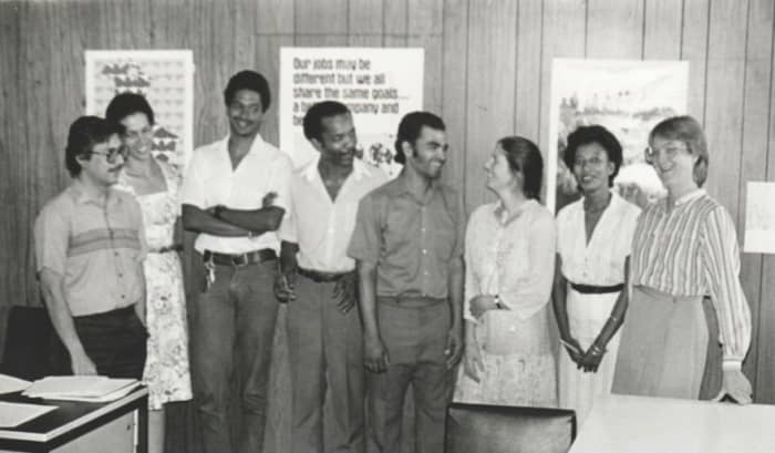 This photograph was taken by a client named George. I am standing on the far right wearing glasses. The three on the left were my field officers. The Executive Director is next to them.