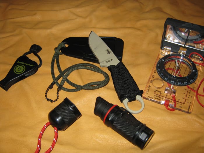 A knife is an integral part of Outbound Dan's Critical Four, along with whistle, fire starter, and compass.