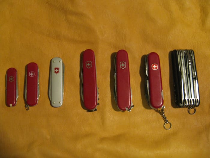 A few Swiss Army Knives from my collection, notice the thick Swiss Champ on the far right.