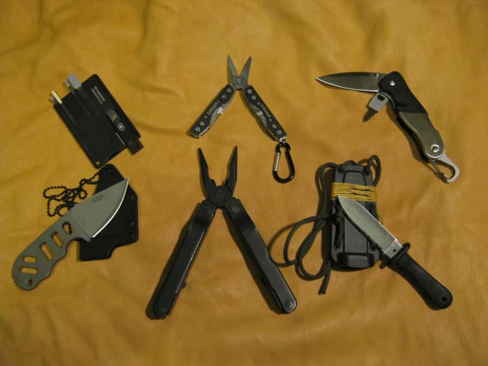 A fine assortment of backpacking knives from survival cards to multi-tools, and neck knives.