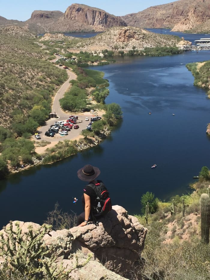 My wife looking down on boats in First Water Creek with Canyon Lake at top.