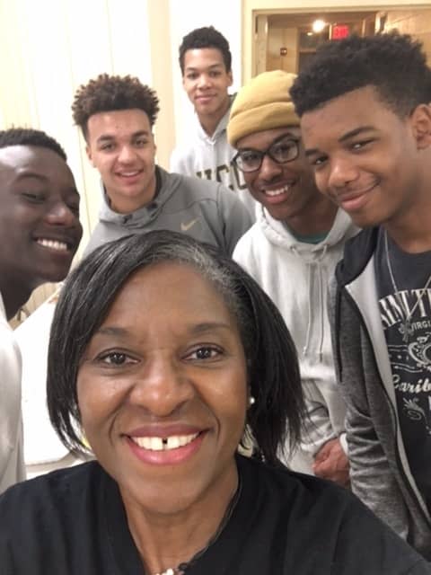 High school students come to the Kwanzaa Kitchen Breakfast Program to in time toward their community service hours.