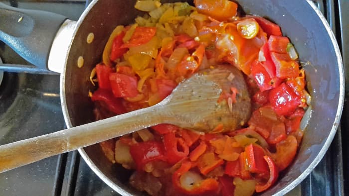 The mixture of onions, tomatoes and peppers makes a tasty sauce, or filling for stuffed vegetables, or an omelette filling.