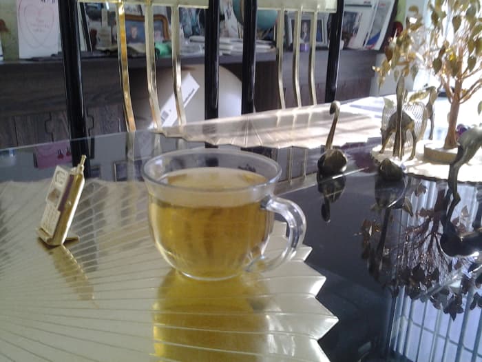 A cup of Sage tea I had a couple of nights ago. 1 Tbs. of rubbed sage leaves steeped in a cup of hot water.