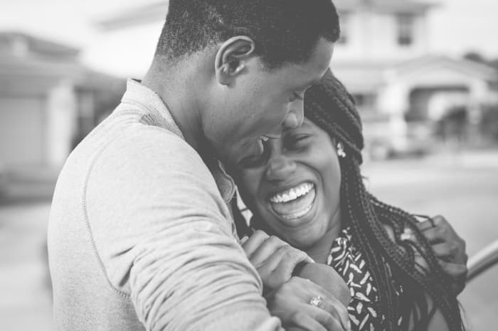 Shared moments become sacred and are cherished forever by a young couple in love.