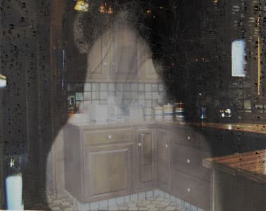 Of course this isn't real - It's my own kitchen with an overlay that I created it in Photoshop. It closely resembles what it is we saw. It was tall to us - we had to look up at it.