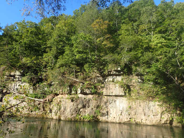 Karst topography is a landscape formed from the dissolution of soluble rocks such as limestone, dolomite, and gypsum. It is characterized by underground drainage systems with sinkholes and caves. (Wiki)