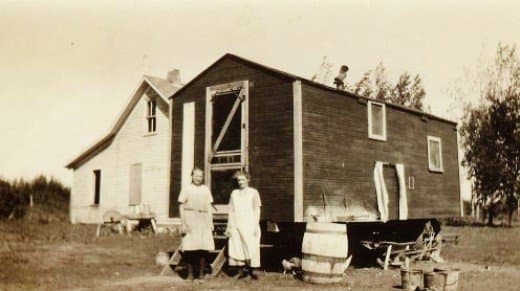 The women would prepare meals and the food would be transported to the men in the field during threshing time. This building called a "cook house" was on wheels and the horses would pull it.