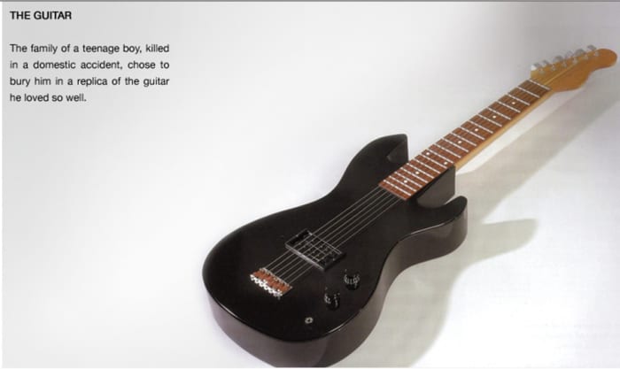 This British casket was made for a teenage boy who died in an accident. It's in the form of his favorite guitar.