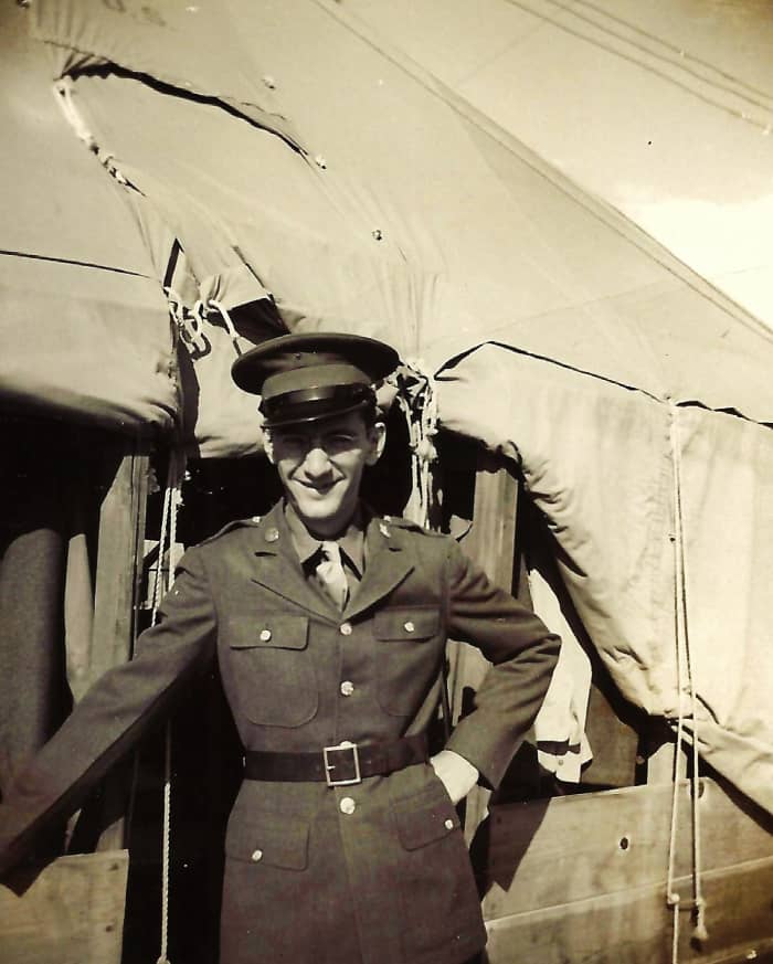 This is the happy father! Written on back..."This is me in my O.D.'s with blouse and service cap." (Note: O.D's means Olive Drabs)