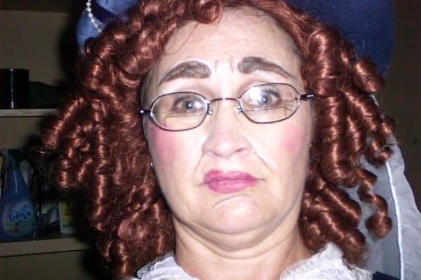 Here Chris is in costume in a comedic role in a play. She looks more like Raggedy Ann than a fairly princess.
