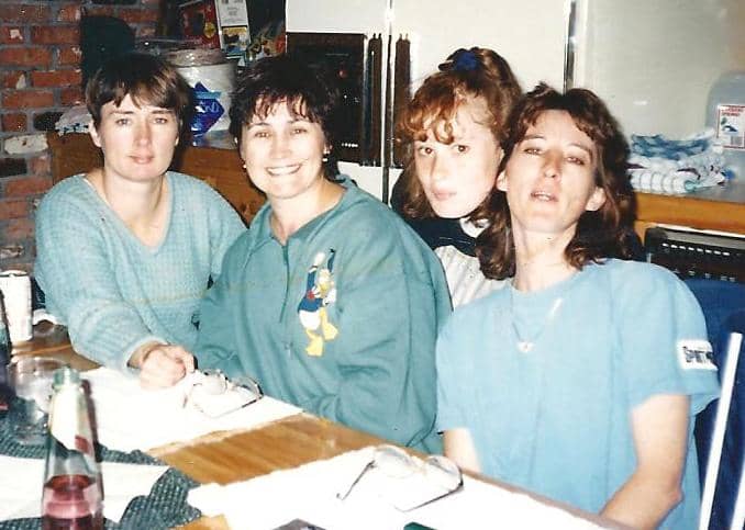 My sisters and I and my niece about 1995. Me at the far left, then Chris, Jamey at the far right, niece Michelle behind.
