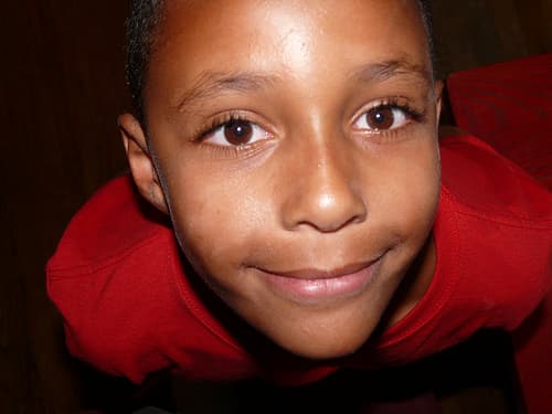 The eyes of innocence shine brightly before becoming dimmed by the horrors of violence.