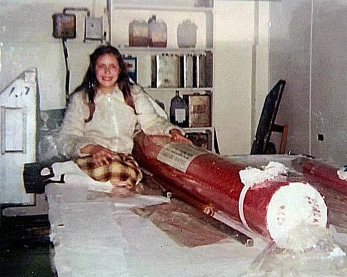 This was me aged 11, pictured at the rock factory where my mum worked, with the "biggest stick of rock in the world". I'm wearing my mum's platform shoes, a fake fur bomber jacket and a mini-kilt, fashionable at the time, although cringe-worthy now!
