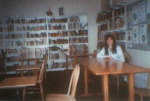 Me sitting in the library of my former school, 20 years after leaving, just before it was closed down to convert it into flats.