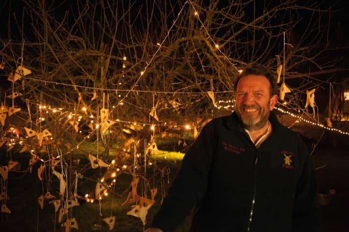 Nigel Smith, landlord of The Fleece at Bretforton, with the orchard in the background.