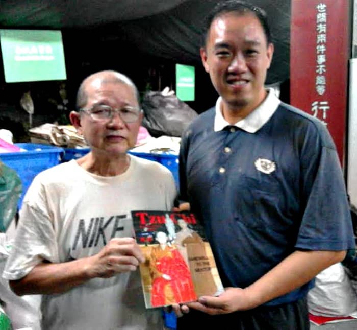 Tzu Chi Brother Edwin Khoo and Good Guy with the magazine he gave me. Photo taken on Nov 14, 2016