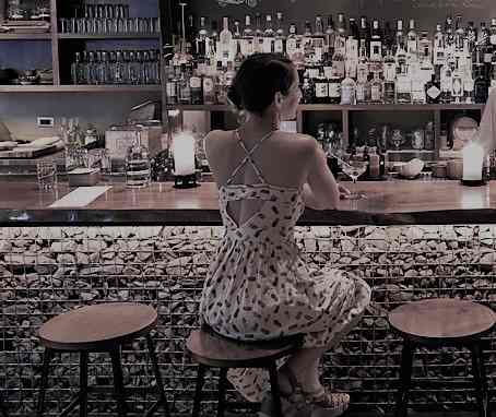 She stayed a while longer to finish her drink. Then, she paid her tab and left the scene, feeling emptier than when she had entered.