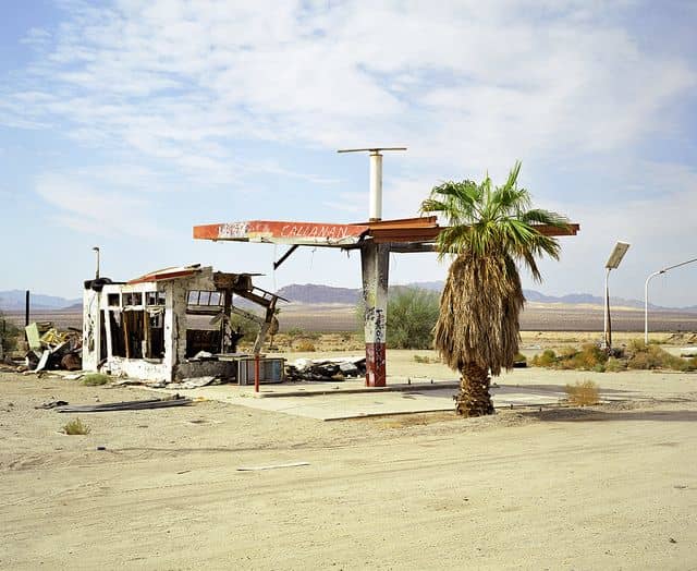 He finished fueling, twisted the cap and paid the attendant. “Nothing for me?” Adam asked. “Nothing.”