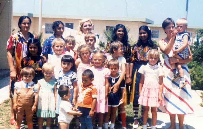 Pic4: Snapping with the children with their mothers at a birthday party including my sisters and myself