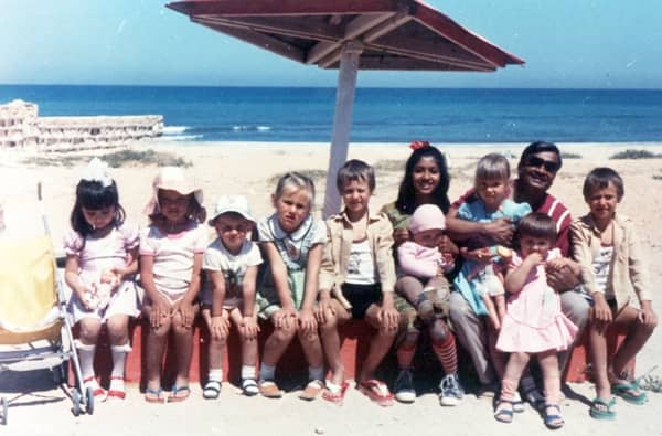 Pic3: Snapping with the children in the hot summer breeze along with a year younger sister and Dad