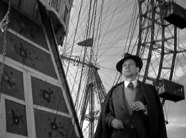 Here's Joseph Cotten at the entrance to the Giant Wheel, waiting for Orson Welles to appear mysteriously. i've been on it two or three times, and the cabins are the same old wooden ones as originally provided for passengers