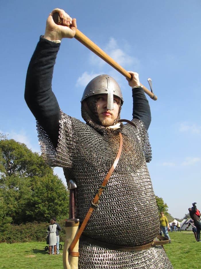 One of the Hildsvin (Battle Boar) group of re-enactors in mailcoat and helm with Dane Axe - the Normans were terrified of Harold's huscarls armed with these weapons