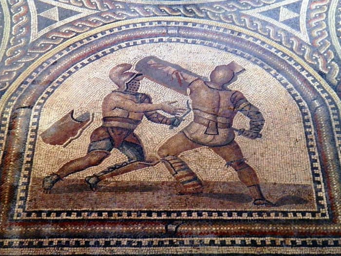 Details of Gladiator Mosaic. A Thraex (left) fighting a Murmillo (right). Romerhalle, Bad Kreuznach, Germany.