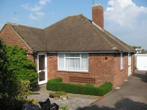Our house (bungalow). Back door is on the right of the house, just before the garage
