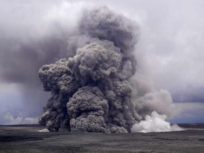 Ash plume rises into the sky at Halemaumau crater. (Photo courtesy of USGS-HVO)