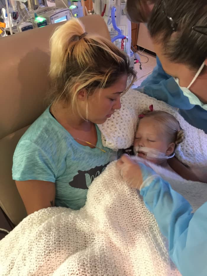 I waited outside for her brain scan to be over and all I could think was that she needed her mommy to hold her. I can’t begin to explain it, but when they placed her in my arms I felt peace for the first time in days and I know she did too.