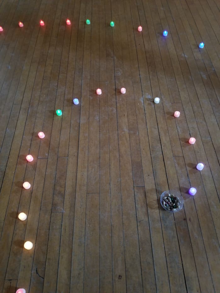 At the center there are gifts of stones and shells to bring back to us the memory of our time spent in Sacred Space.