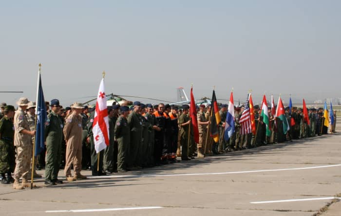 One example of security cooperation is the Partnership for Peace. Multinational military exercises inlcude examples like the Cooperative Archer in Tbilisi, Georgia, in July 2007 with 500 servicemen from four NATO members, eight PfP members, and Jorda