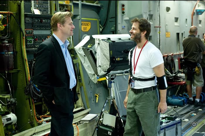 I couldn't find one including David S. Goyer, so imagine he's that piece of equipment standing behind Christopher Nolan and Zack Snyder.