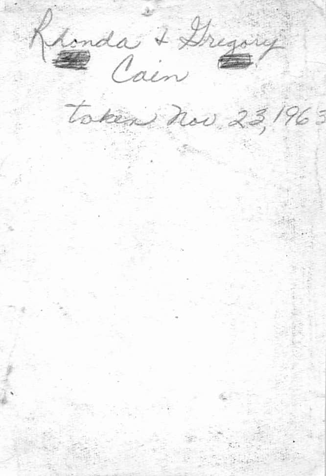 Back of the picture with my mom's handwriting and the date just one day after the fateful day...