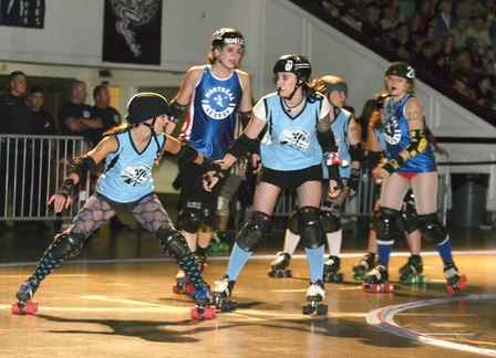 Roller derby skater using a plough stop