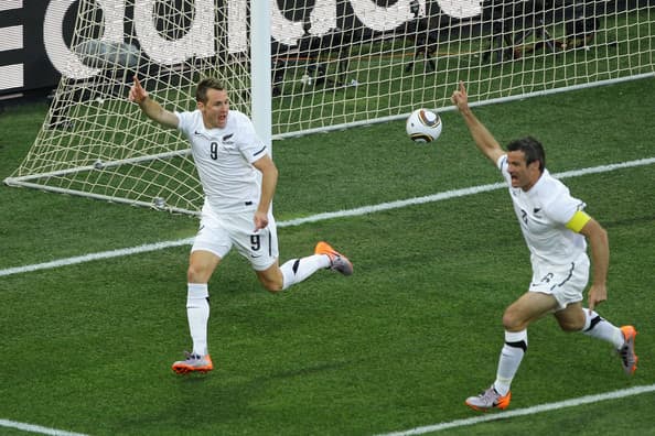 Shane Smeltz (9) celebrates with captain Ryan Nelsen after Smeltz scored against Italy in a World Cup match in Nelspruit, South Africa.