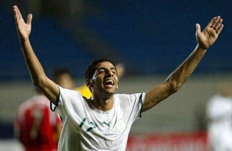 Taisir Al-Jassim of Saudi Arabia celebrates after scoring against Bahrain in a group stage match in Palembang, Indonesia. Saudi Arabia won 4-0 to eliminate its opponents from the tournament.