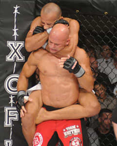 The legs wrapped tightly round mean that the man being choked can't throw the choker off him.