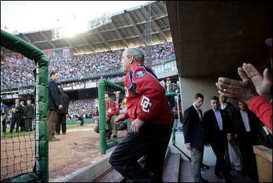 President George W. Bush prepares to throw out the first pitch at the Opening Day game of the Washington Nationals' 2005 inaugural season.